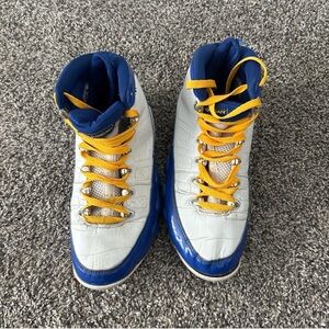 White and Blue Sneakers with Yellow Laces